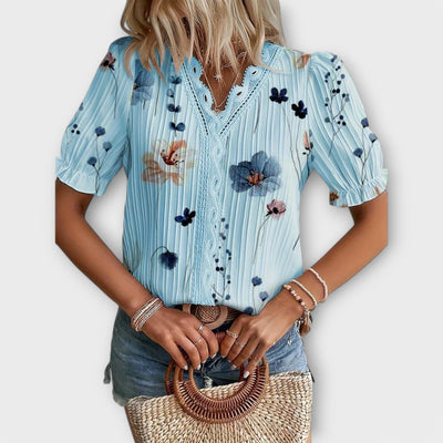 Emily - Modieuze blouse met spitse halslijn