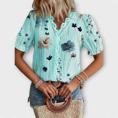 Emily - Modieuze blouse met spitse halslijn