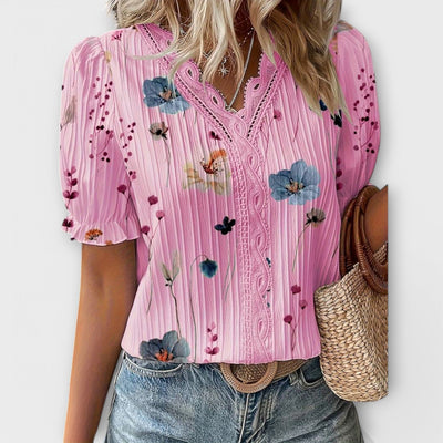 Emily - Modieuze blouse met spitse halslijn