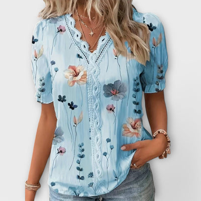 Emily - Modieuze blouse met spitse halslijn