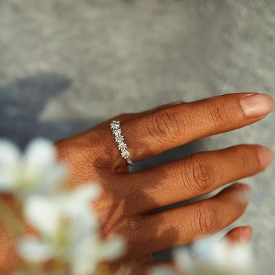 Verstelbare zilveren ring met handgeschilderde madeliefjes van emaille