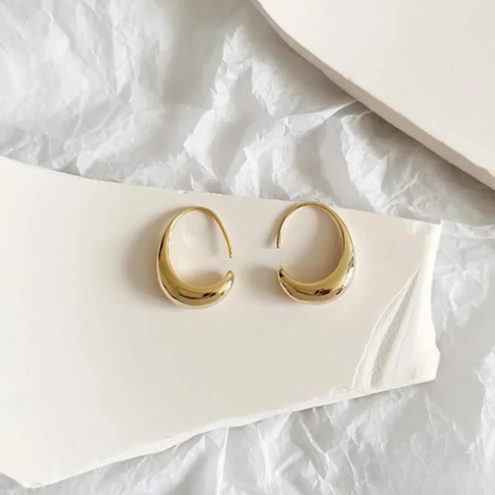 Elegante oorbellen van goud en zilver