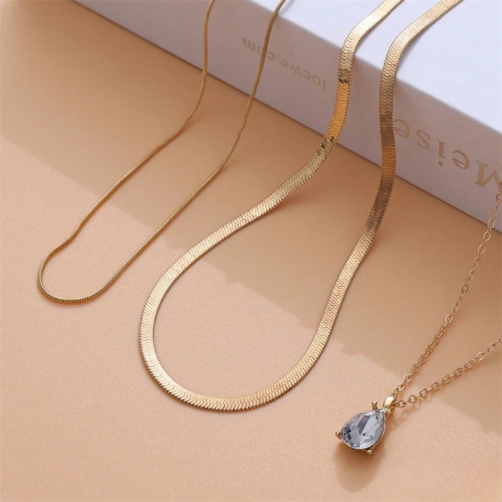 Schicht-Halskette met gouden zirkonia-hanger