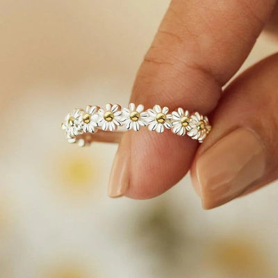 Verstelbare zilveren ring met handgeschilderde madeliefjes van emaille